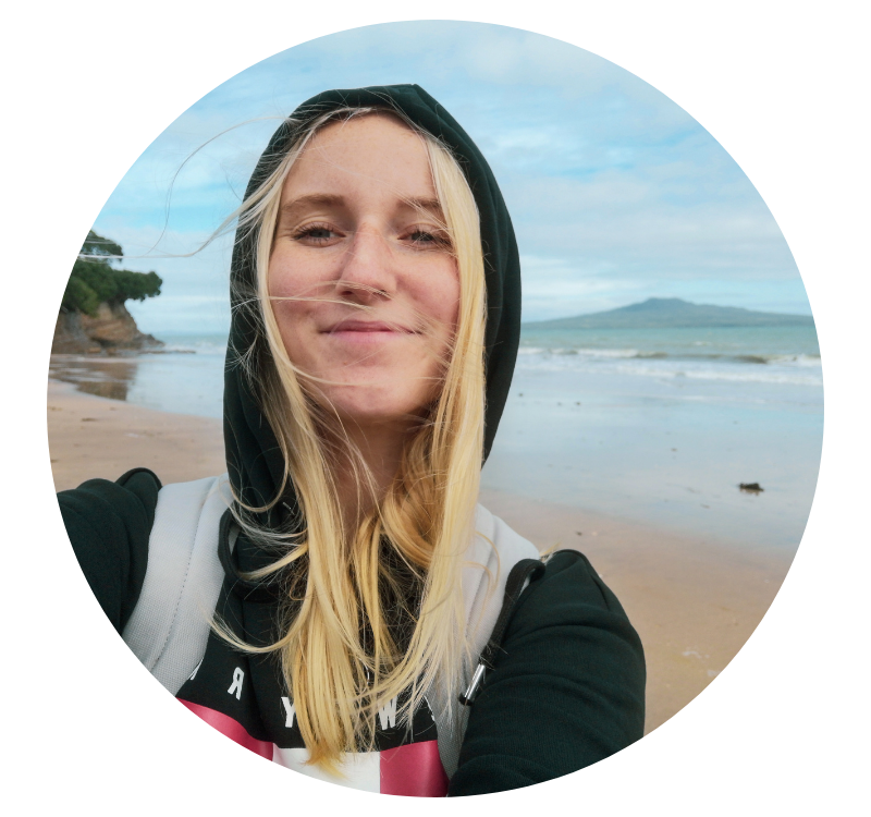 Abby D., Student Girl at beach with hoodie